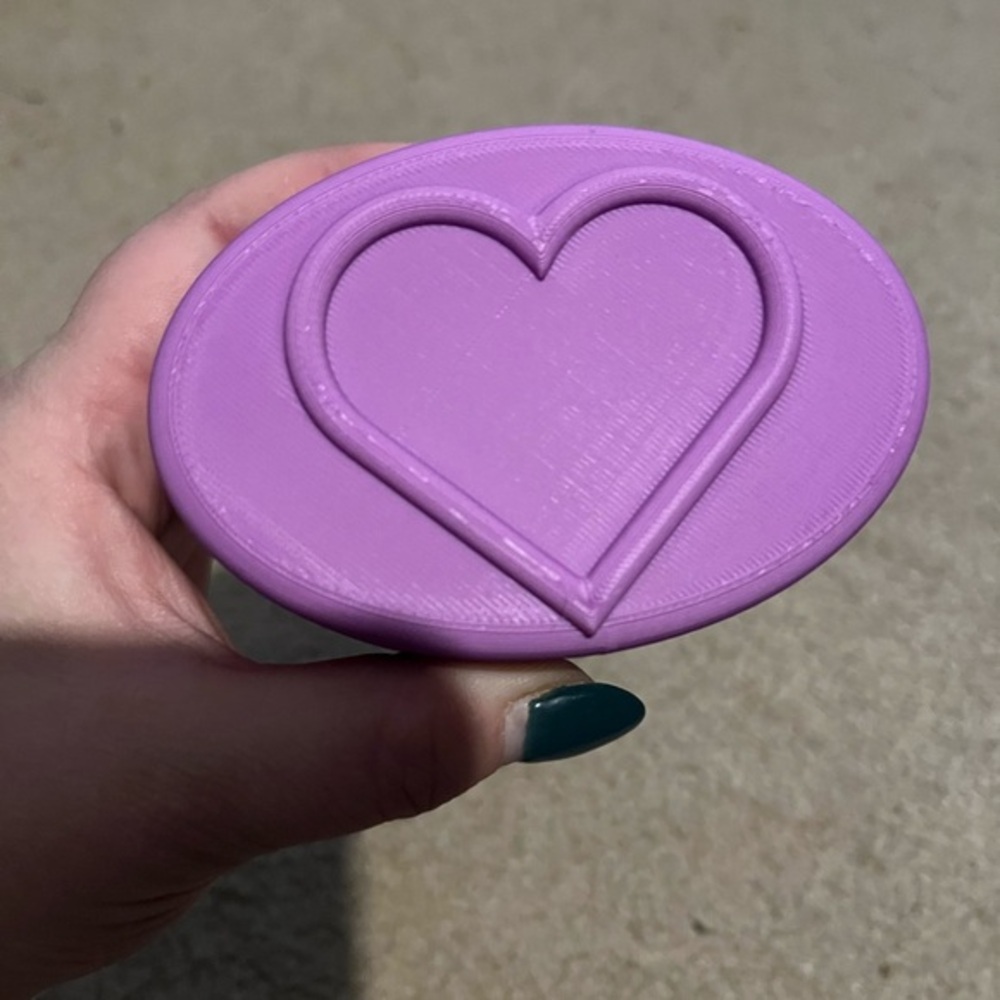 Purple Heart-Shaped case made with a 3D printer.